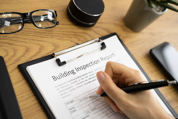 istock African American Inspector Checking Building Report 1313113972