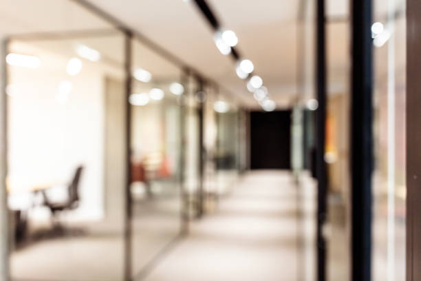 istock Defocused office background, open space with glass partitions and desks 1313115087