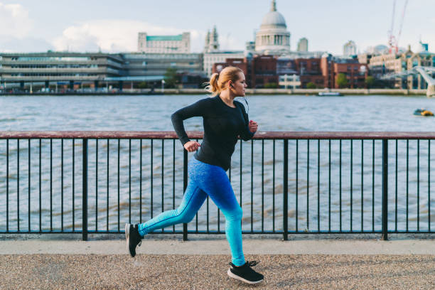 istock Woman jogging in London 1313115089