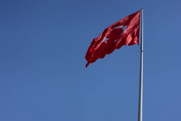 istock Turkish flag waving in the wind 1313117796