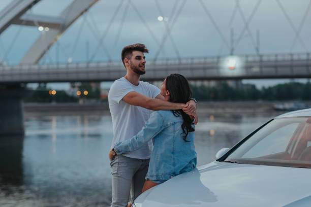 istock An affectionate young couple on date by river 1313117814