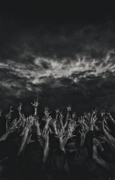 zombie hands rising in dark night - apocalypse date imagens e fotografias de stock