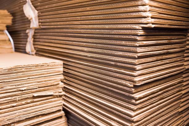 istock Close-up sides of stacks of cardboard folded 1313121228