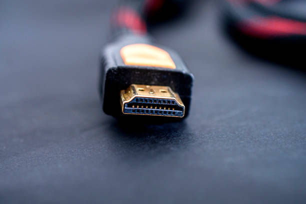 istock HDMI audio video cable on black background 1313122086