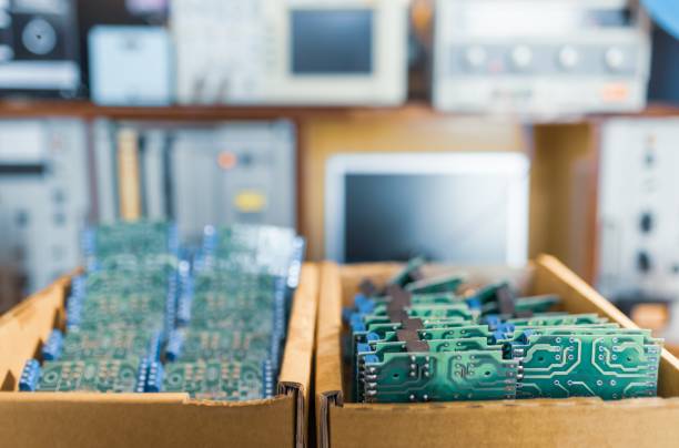 istock Close-up electric green embedded microcircuits in production 1313122133