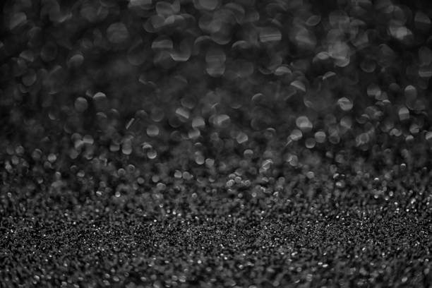 istock Detailed texture of black glitter dust surface 1313126671