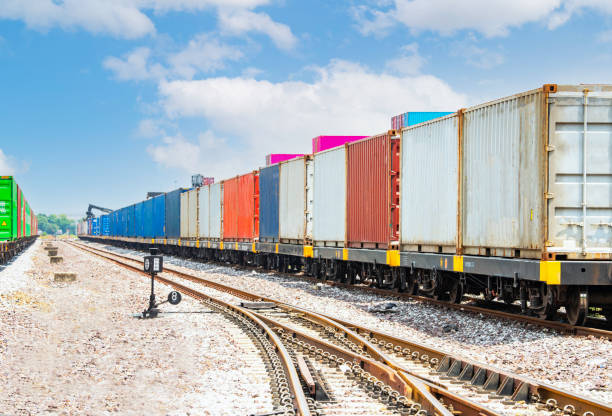 freight train carrying containers at inland container depot station"n"n - electrical junction box imagens e fotografias de stock