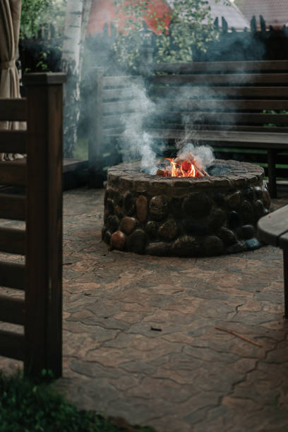 istock Flame and smoke of fire in the stone hearth 1313134154