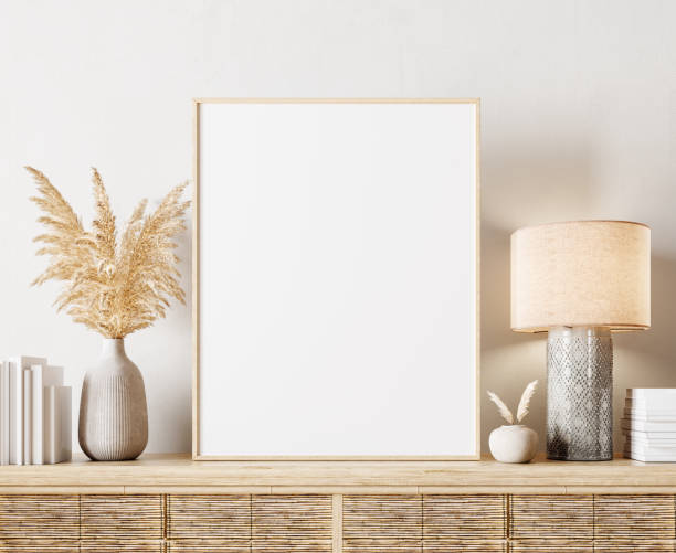 istock Modern interior design in natural colors with dry plants decoration and empty white mock up picture frame 1313136528