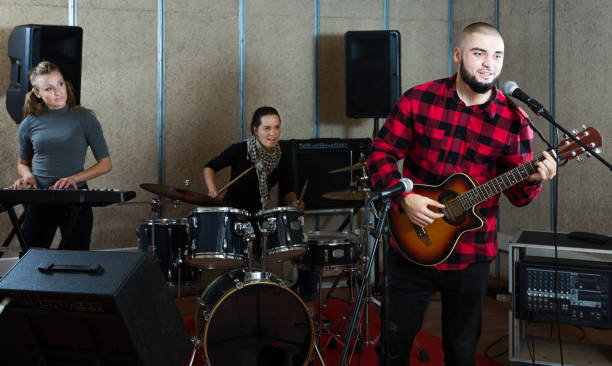 istock Emotional guy with guitar rehearsing 1313136736