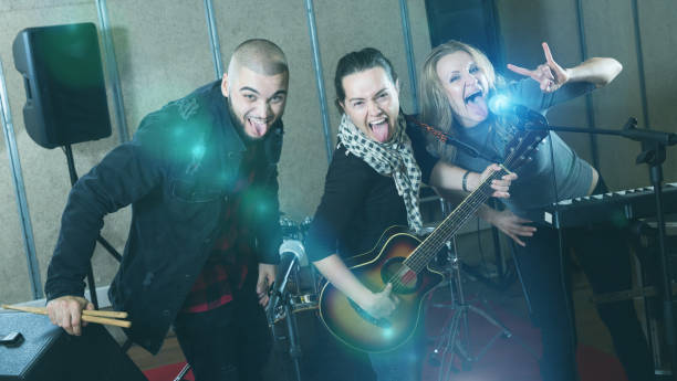 istock Glad guitarist, drummer and keyboardist 1313136877