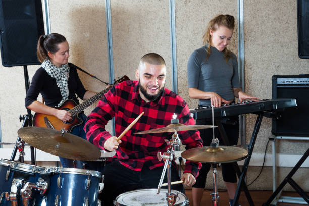 istock Garage band rehearsing in studio 1313136913