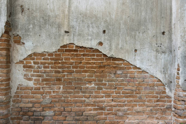 istock Old cracked concrete brick wall, grunge background 1313139711