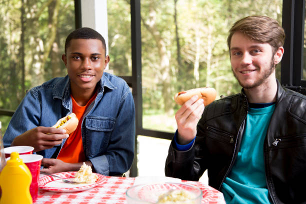istock Multi ethnic group of young men at a cook out. 1313140666