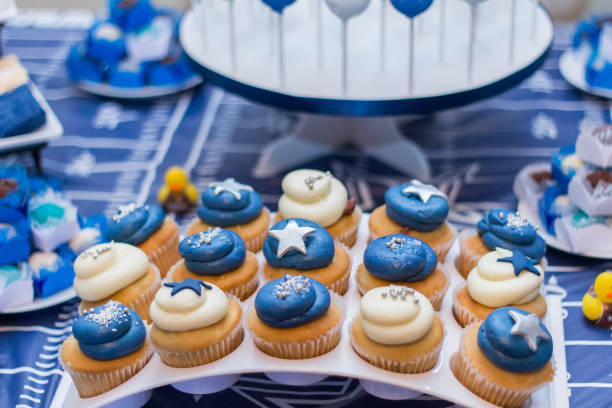 istock White and blue cowboys cupcakes with star shape on top. 1313141065