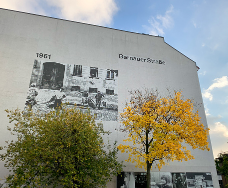 Berlin, Germany - November 10, 2019: Bernauer Strasse photos depicted the place of the Berlin wall over the years divides east and west Berlin in Germany
