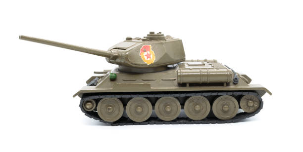 toy model of a tank from the USSR made of metal on a white background, isolated object stock photo