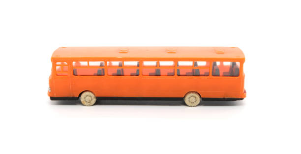 istock toy bus (model) made of plastic on a white background, isolated object 1313145255