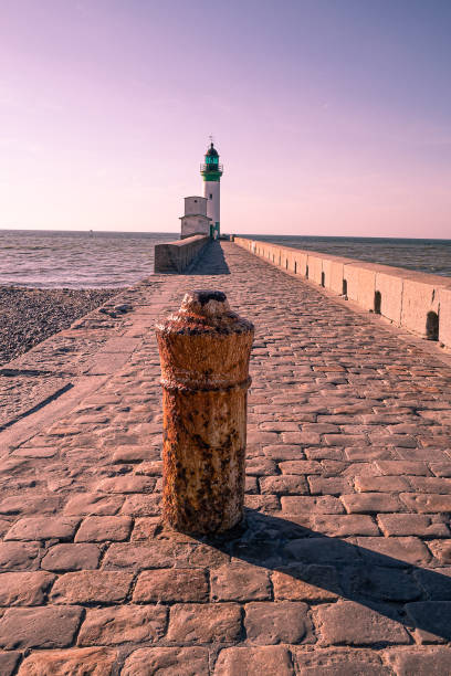 istock Dike to the lighhouse 1313147345