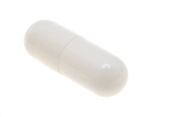 istock medicine in capsules isolated 1313148285