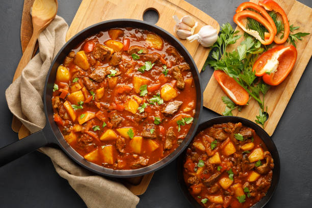 istock Goulash, beef stew with vegetables in tomato sauce 1313149360