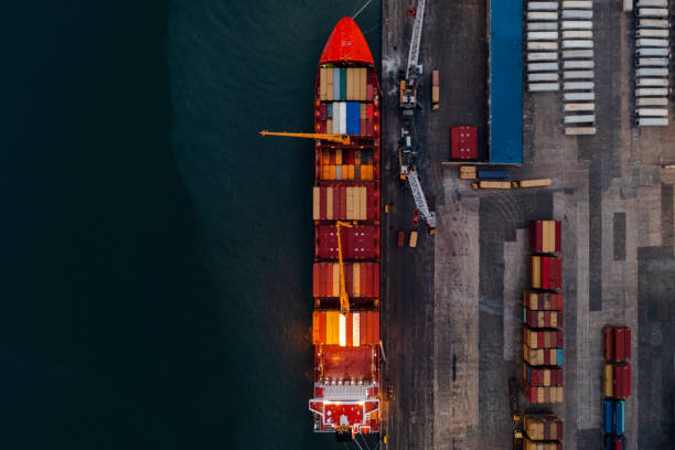 istock Aerial view of Cargo Container Terminal at night. 1313151049