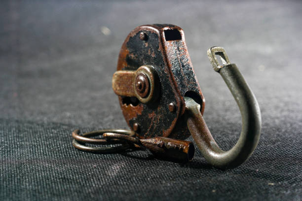 istock Old padlock with rust but fully functional photographed in the studio 1313152242