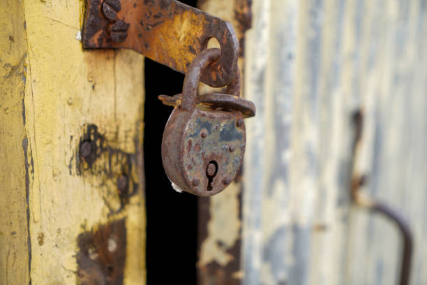 istock Old padlock with rust but fully functional photographed in the studio 1313152358