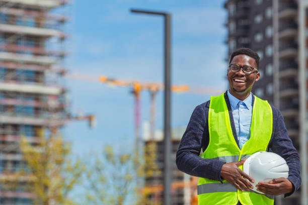 istock Portrait of a happy construction worker at a building site. 1313154663