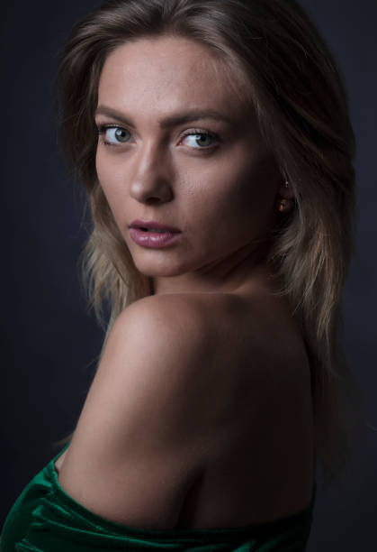 istock studio portrait of a young woman 1313160829