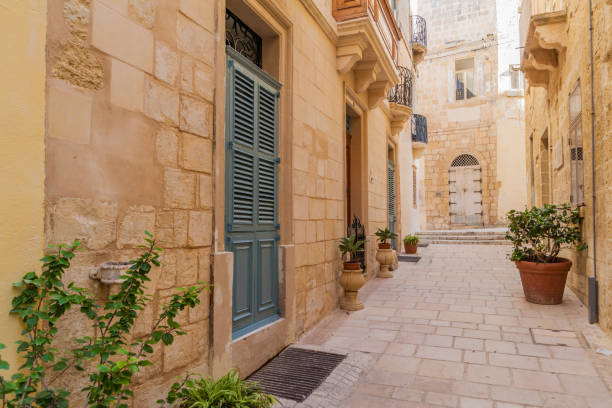 istock Typical narrow street in Birgu town, Mal 1313162712