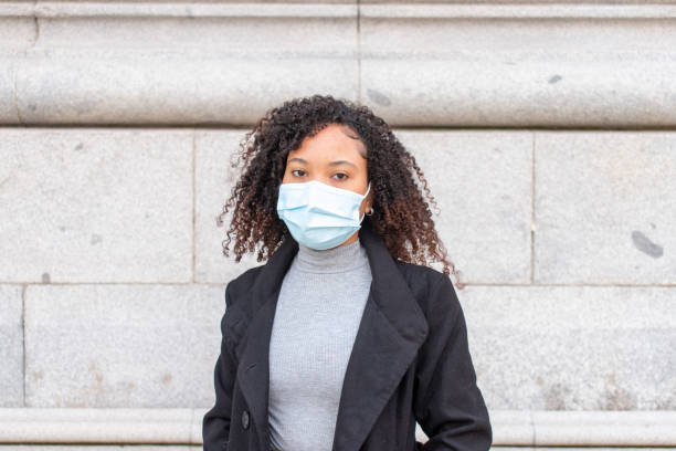 istock woma wearing a mask 1313167862