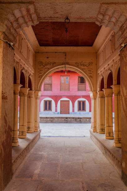 istock Colonnaded way into a courtyard in Vrindavan, Uttar Pradesh state, Ind 1313169630