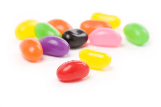 Colorful jellybeans close up shot with white background