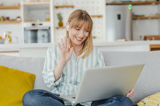 istock Young woman on a video call at home 1313174475