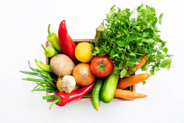 istock Fresh Vegetables in basket on white isolated background top view. 1313178318
