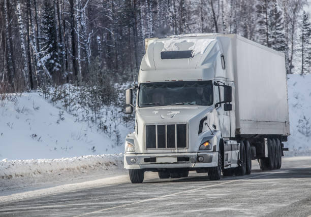 istock truck moves on a winter road 1313181747