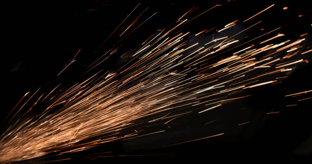 istock Stream of sparks on a black background 1313181756