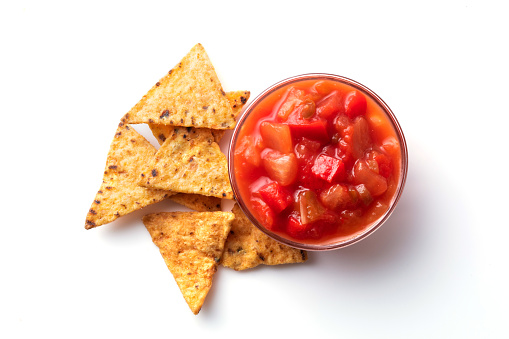 Corn chips nachos and salsa sauce isolated on white background