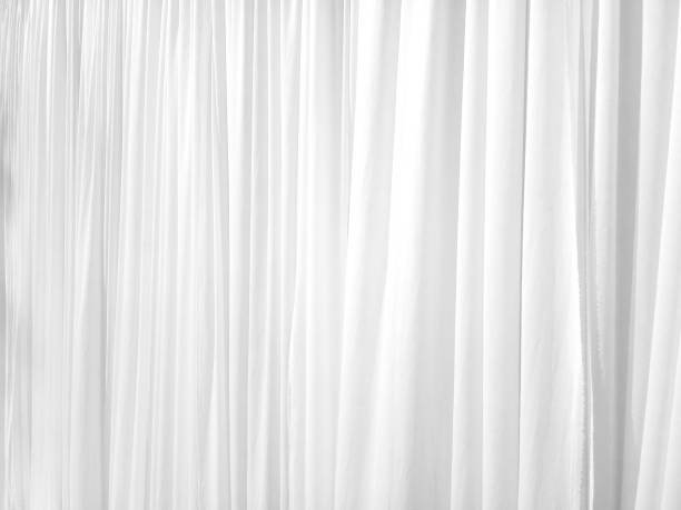 istock Soft white curtains are simple yet elegant for graphic design 1313186741