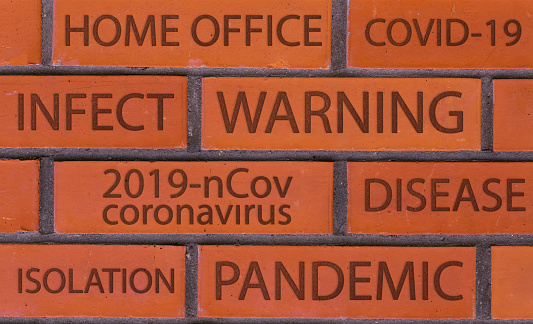 tag cloud coronavirus, covid 19, pandemic, home office on brick wall background