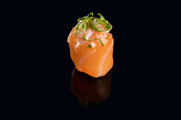istock Sushi isolated on black background 1313191236