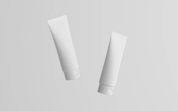 istock 100ml Cosmetic Cream Tube Packaging Mockup - Two Floating Tubes 1313194179