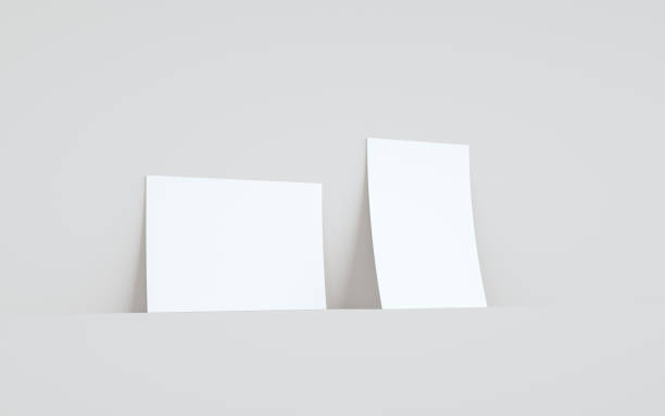 istock A5 Flyer / Brochure Mock-Up - Two Flyers Against Wall Background 1313194185