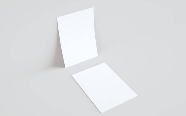 istock A5 Flyer / Brochure Mock-Up - Two Flyers Against Wall Background 1313194188