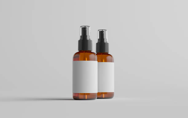 istock Amber Spray Bottle Mockup - Two Bottles. Blank Label 1313194207