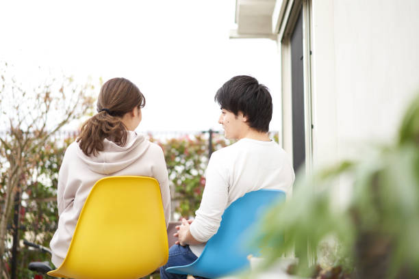 istock Asian couple chatting in the garden 1313194572