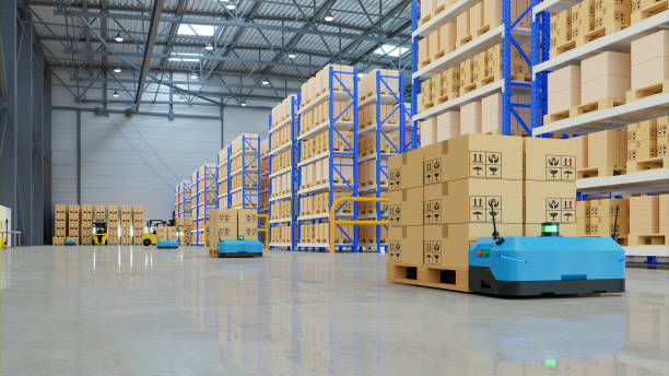 Robots efficiently sorting hundreds of parcels per hour,pallet lifter AGV. Robots efficiently sorting hundreds of parcels per hour,pallet lifter AGV.3d rendering independence stock pictures, royalty-free photos & images