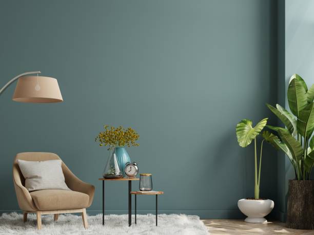 istock The interior has an armchair on empty dark green wall background. 1313196954