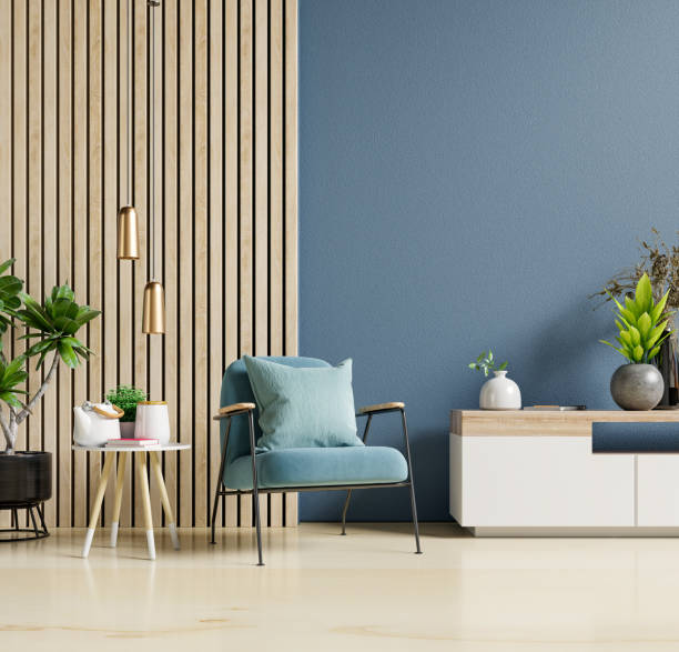 istock The interior has an armchair on empty dark blue wall background. 1313196957